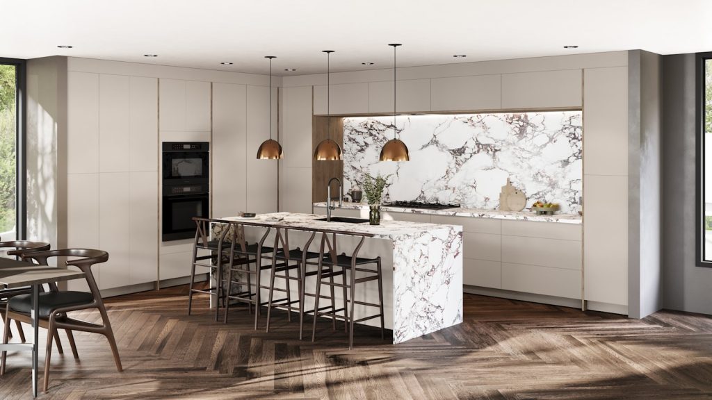 Cashmere handleless flat slab kitchen cabinets with copper dome pendants and built-in black ovens. Fabuwood Catalina.